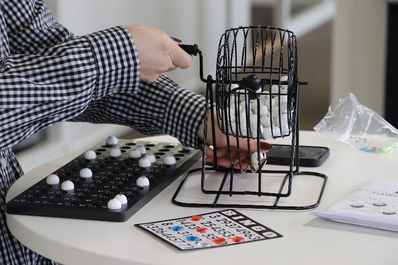 Colleagues playing Bingo together at the office